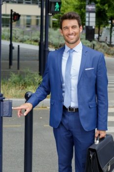 male businessman crossing the road