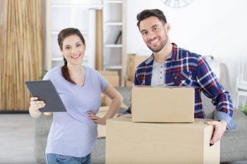 couple expecting baby moving into new property
