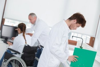 Students in science lab, one in wheelchair