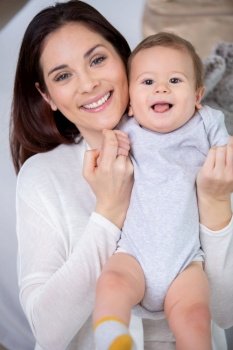 home portrait of a baby boy with mother