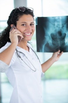 medical doctor woman have a positive talk on mobile