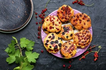 Appetizing pastry with red currants. Cookie with fruit berries. Homemade cookies with currants.