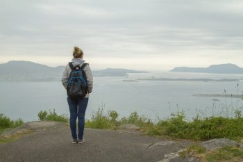 girl on the edge of the fjord