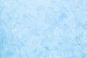 background of light blue  textured handmade mulberry paper