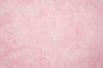 background of light pink, textured, handmade mulberry paper