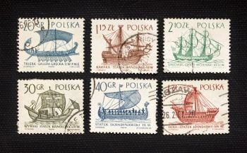 antique sailing ships on a set of vintage, canceled post stamps from Poland
