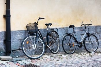 two bicycles on a city street