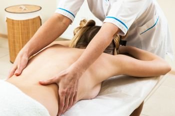 massage girl in a modern beauty salon