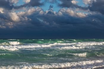 a ocean waves and stormy sky