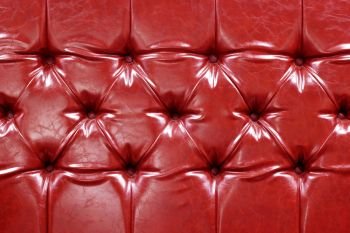 photo of red leather as texture background
