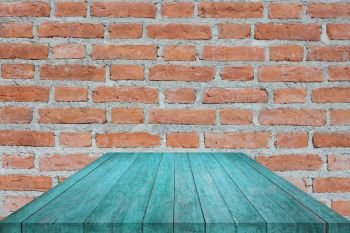 Perspective blue top wooden on brick wall, stock photo