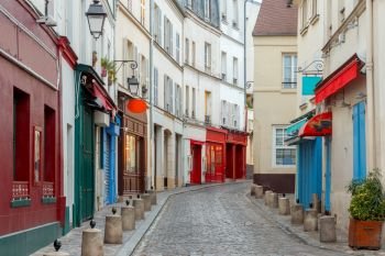 Old traditional street on the Montmartre hill in the early morning. Paris. France.. Paris. Old street on the Montmartre hill.