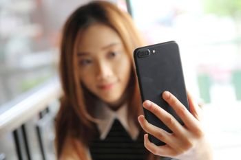 Asian young woman selfie