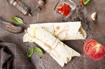 Homemade lavash, shawarma with vegetables, chicken, cheese