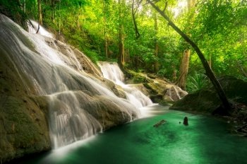 Pha Tad Waterfall is a three-tiered waterfall located deep inside the Khuean Srinagarindra National Park Kanchanaburi.. Pha Tad Waterfall.