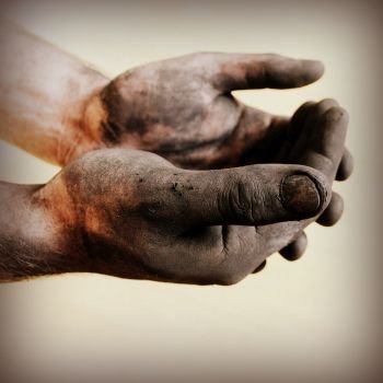 dirty hand isolated on a dark background .. dirty hand isolated on a dark background