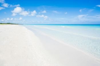 wonderful beach of Varadero during a sunny day, fine white sand and turquoise and blue Caribbean sea,sky with clouds,Cuba.