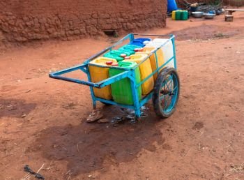 Colored plastic containers in village in Burkina Faso