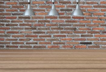 Silver lamps on the ceiling and a backdrop on a brick wall with brown wood floor,concepts of interior design.
