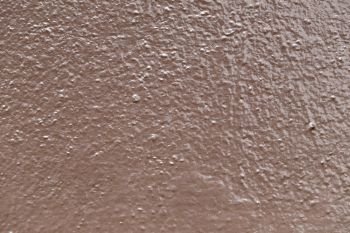 Textures of brown cement wall for the background.