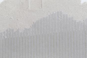 Texture of the gray paper box or cardboard for the design background.