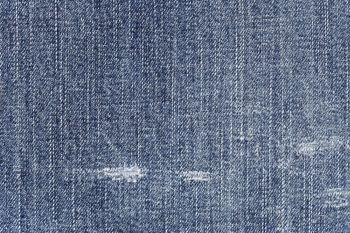 fabric pattern texture of denim or blue jeans for the design abstract background.
