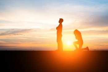 Silhouette of couple upset,man and women are quarrel in sunset t. Silhouette of couple upset,man and women are quarrel in sunset time.