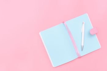 workspace desk styled design office supplies  on pink pastel background minimal style