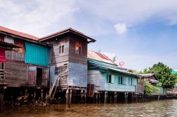 APR 20, 2013 Bangkok, Thailand - Thai wooden houses along Bangkok Yai canal or Klong Bang Luang