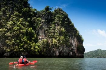 Kayaking at Rock island of Koh Talabeng near Koh Lanta, Krabi, Thailand