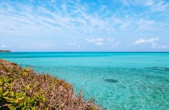 Very beautiful tropical sea crystal clear turquoise water and rock at Ikema bridge, Miyako island, Okinawa, Japan.
