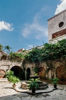 NOV 20,2012 , Manila, Philippines : Old historic beautiful Spanish Colonial house court garden and fountain in Casa Manila near San Augustin church