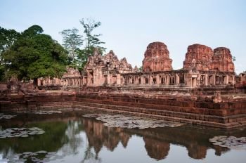 MAY 30, 2014 Buriram, Thailand - Stone temple and Barai pond of Prasat Muang Tam castle, thousand years ancient Khmer architecture, was Hindu shrine 