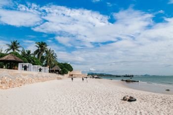 Aerial view of Hua Hin beach blue sea in summer, Thailand coast  tropical beach destination with beach umbrellas