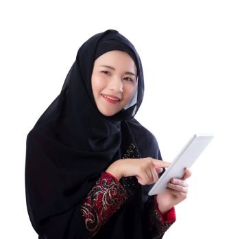 Islam woman with tablet computer isolated on white background.