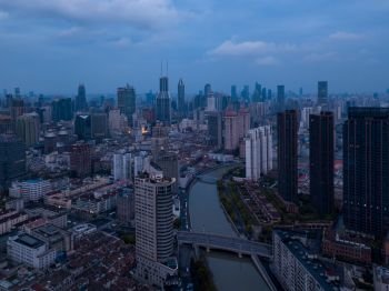Aerial view of skyscraper and high-rise office buildings in Shanghai Downtown, China. Financial district and business centers in smart city in Asia.