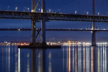 Evening view at Forth Road Bridge and Queensferry Crossing over Firth of Forth near Queensferry in Scotland. Road Bridges over Firth of Forth near Queensferry in Scotland