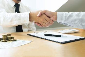 Business handshake. Business people shaking hands, finishing up a meeting,Success agreement negotiation.Business concept.