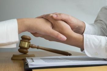 Lawyer touch and respect clients to trust partnership.Trust Promise Concept.