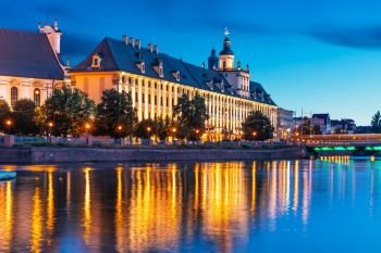 Scenic summer night view of the University building and Oder river embankment in the Old Town of Wroclaw, Poland
