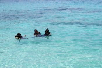 KRABI, THAILAND - APRIL 24, 2016 : Diving lesson in sea to the tourists in front area of Phi Phi Island.