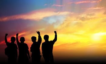 Silhouette team work sunset background ,Business Success Concept