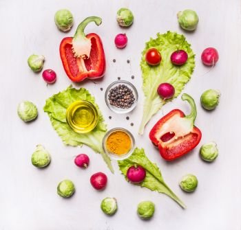 cooking vegetarian peppers, lettuce, sprouts, seasonings on wooden rustic background top view