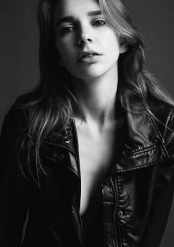 Portrait of beautiful woman girl leather jacket black and white
