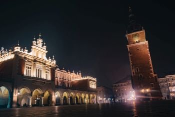 Town Hall Tower in Krakow, Poland. Night dusk shot of famous historic building