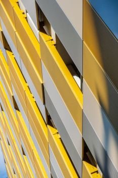 Contrasting colors and shapes on building facade in the city center of  Manchester, UK