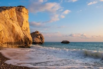 Afternoon view of breaking waves at the beach around Petra tou Romiou, in Paphos, Cyprus. It is considered to be Aphrodite’s birthplace in Greek mythology.