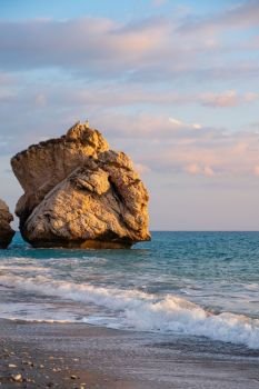 Afternoon view of breaking waves at the beach around Petra tou Romiou, in Paphos, Cyprus. It is considered to be Aphrodite’s birthplace in Greek mythology.
