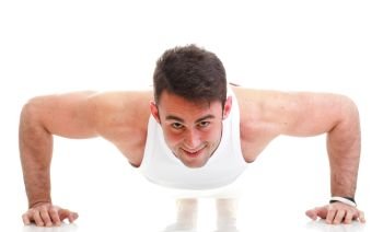 Sexy Young fashion sport man, fitness muscle model guy making push ups exercise white background