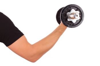 Hand firmly holding a dumbbell. Isolated on white background.